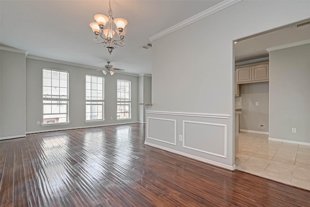 unfurnished room with ceiling fan with notable chandelier, light hardwood / wood-style flooring, and ornamental molding