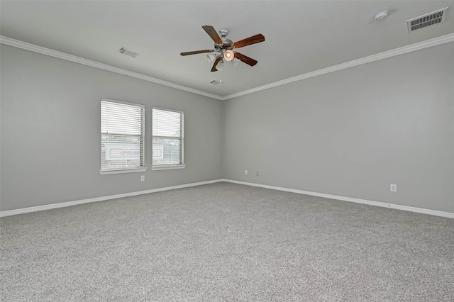 carpeted empty room with crown molding and ceiling fan