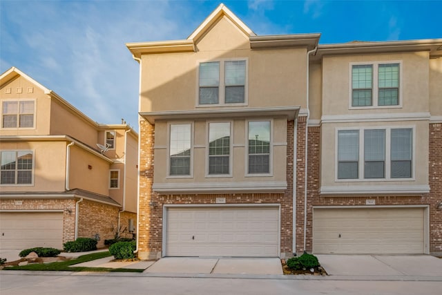 7816 Stoneyway Dr, Houston, TX 77040 - multi unit property featuring a garage, concrete driveway, and stucco siding