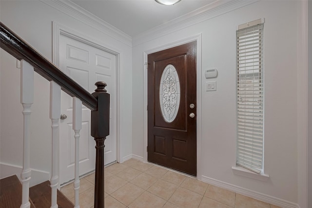 7816 Stoneyway Dr, Houston, TX 77040 - entryway featuring light tile patterned floors, baseboards, stairs, and ornamental molding