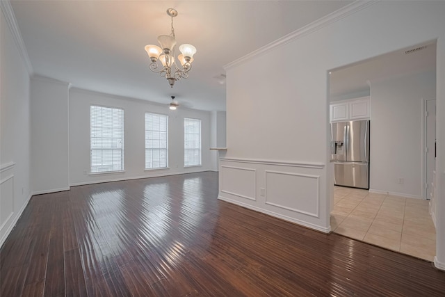 7816 Stoneyway Dr, Houston, TX 77040 - unfurnished living room with a chandelier, crown molding, and light wood finished floors