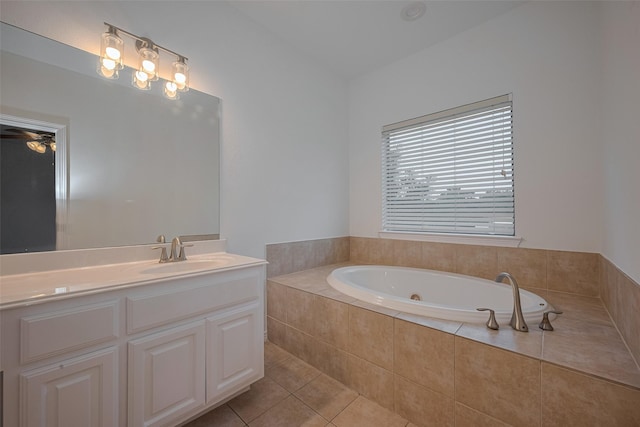7816 Stoneyway Dr, Houston, TX 77040 - bathroom with a garden tub, tile patterned flooring, vanity, and a ceiling fan