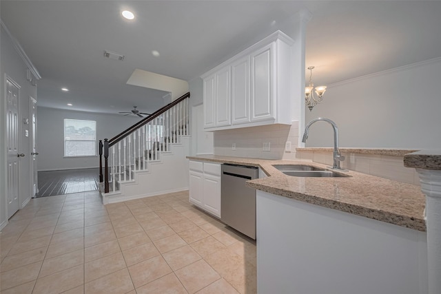 7816 Stoneyway Dr, Houston, TX 77040 - kitchen with a sink, dishwasher, light tile patterned flooring, light stone counters, and white cabinetry