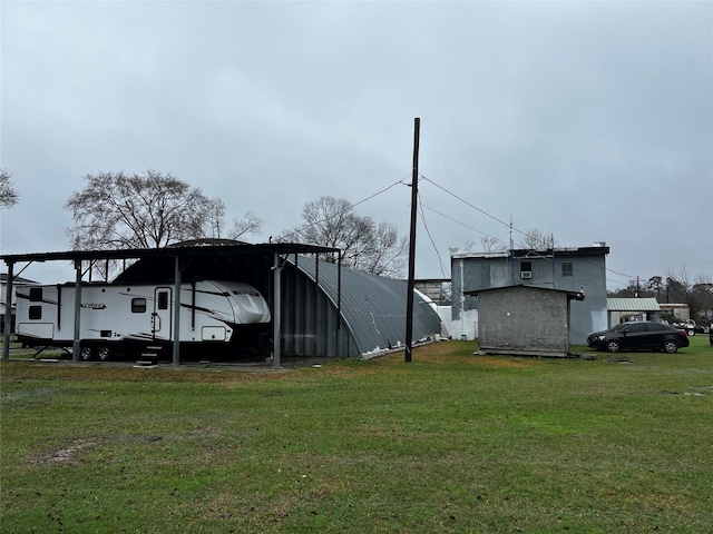 view of yard with a carport