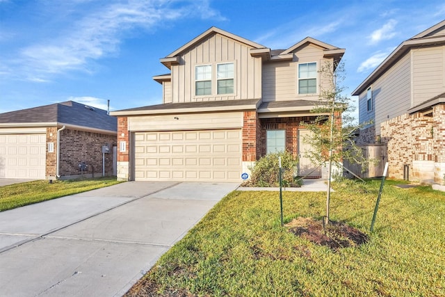 view of front of property with a garage and a front yard