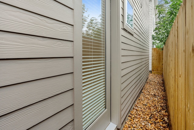 exterior details featuring fence