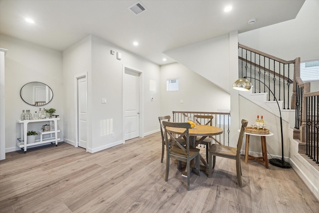 dining area with light wood-type flooring