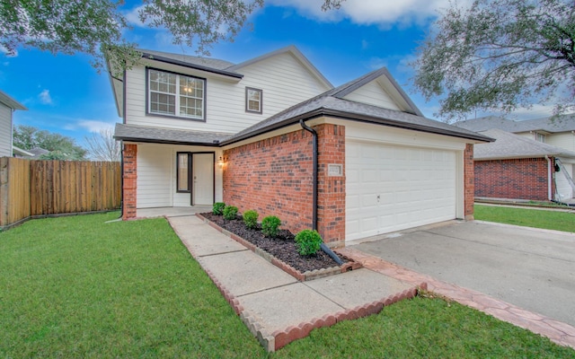 front facade featuring a garage and a front lawn