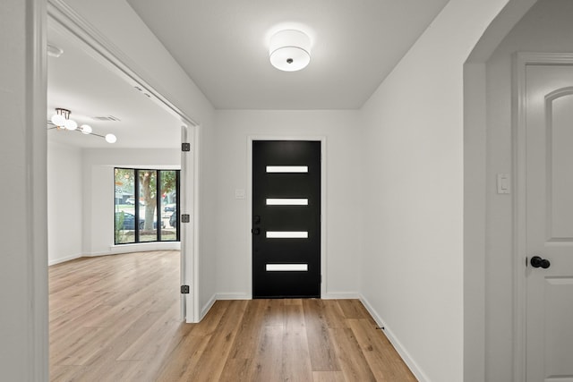 entrance foyer with light wood-type flooring