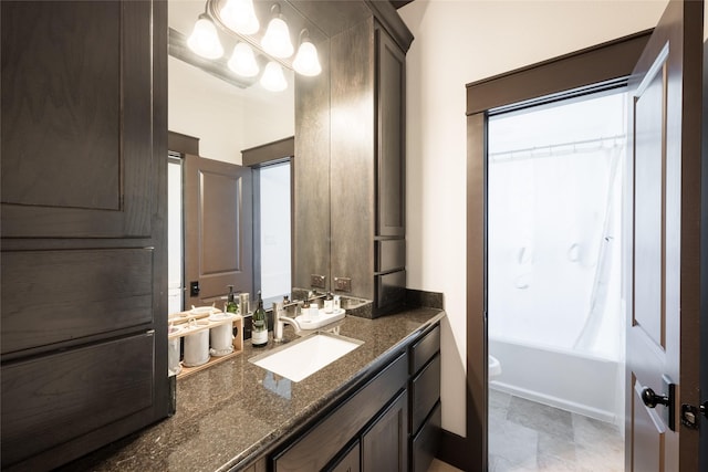 full bath featuring toilet, shower / bathtub combination with curtain, vanity, and an inviting chandelier