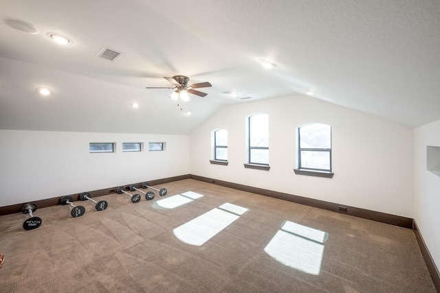 bonus room with vaulted ceiling, carpet floors, visible vents, and baseboards