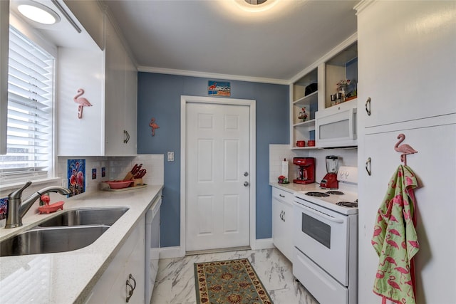 kitchen featuring tasteful backsplash, white appliances, ornamental molding, and sink