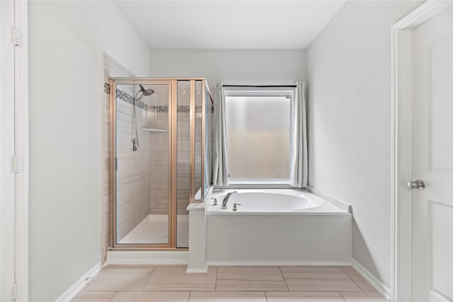 bathroom with independent shower and bath