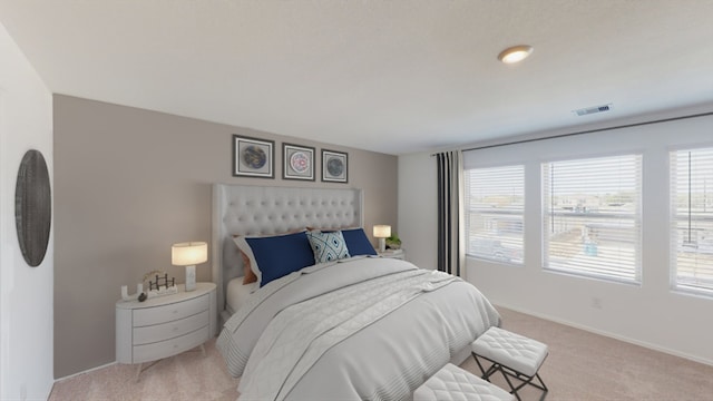 bedroom with light carpet, baseboards, multiple windows, and visible vents