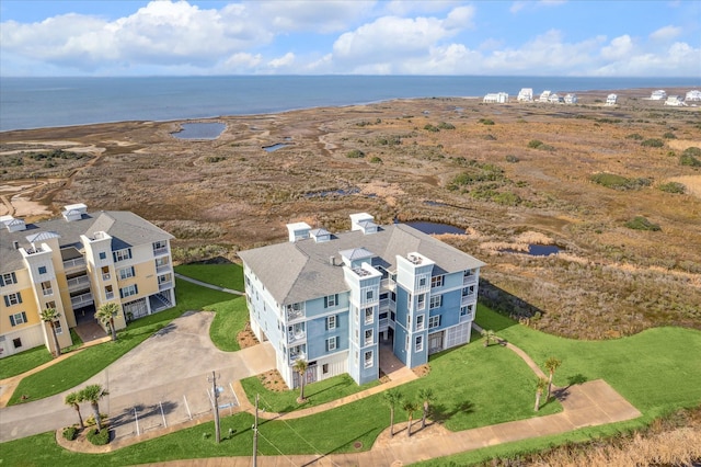 drone / aerial view with a water view