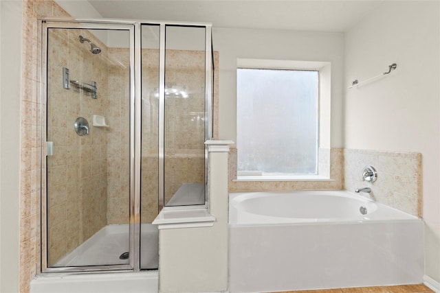 bathroom with independent shower and bath