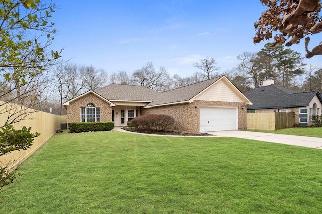 ranch-style house featuring a garage and a front lawn