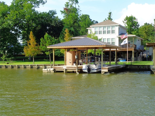 dock area with a water view