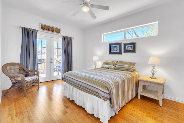 bedroom featuring a ceiling fan, baseboards, light wood-style floors, access to outside, and french doors