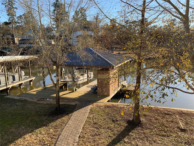 view of dock with a water view and boat lift