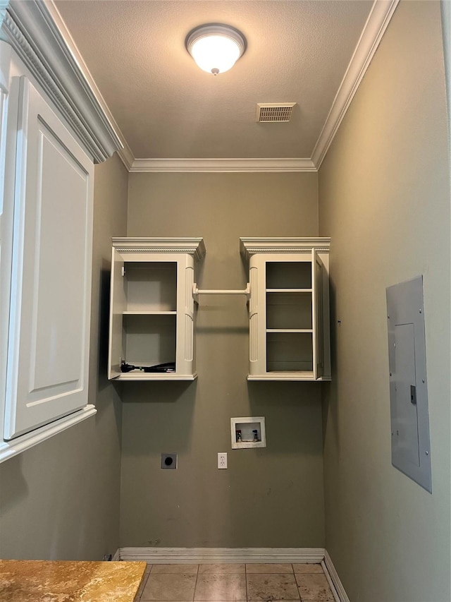 washroom featuring washer hookup, visible vents, electric panel, electric dryer hookup, and crown molding