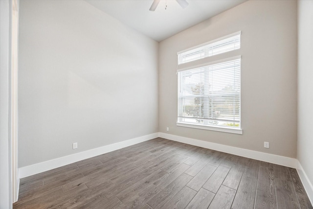 unfurnished room featuring hardwood / wood-style flooring and ceiling fan