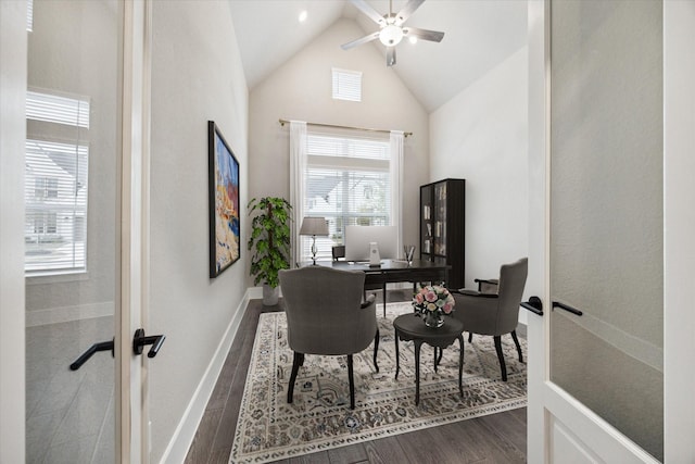 home office featuring ceiling fan, dark hardwood / wood-style floors, and high vaulted ceiling