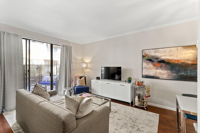 living room featuring dark hardwood / wood-style flooring and crown molding