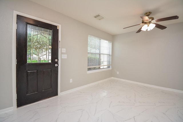 entryway featuring ceiling fan