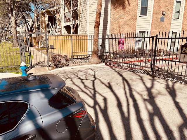 view of patio / terrace featuring a gate and fence