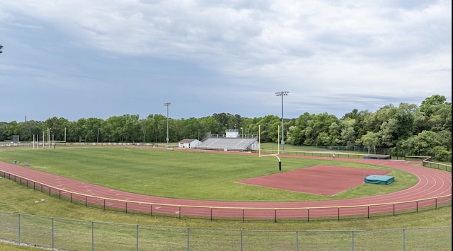 view of property's community featuring a lawn