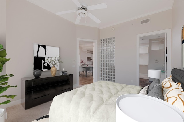 bedroom featuring ornamental molding and ceiling fan