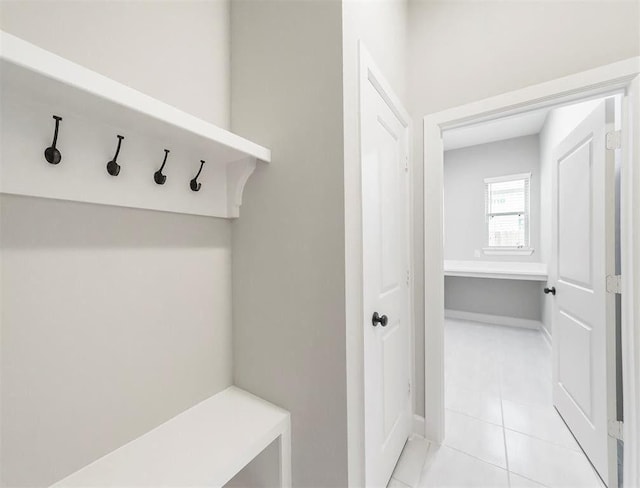 mudroom featuring light tile patterned floors