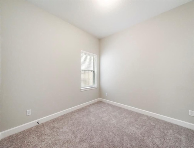 empty room featuring carpet flooring