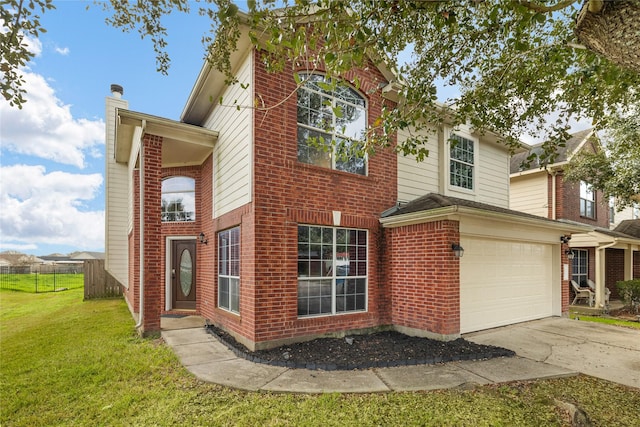 view of front of house featuring a garage and a front yard