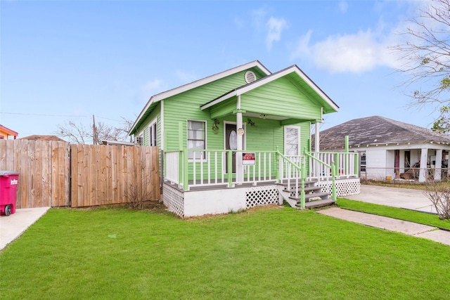 bungalow with a front lawn