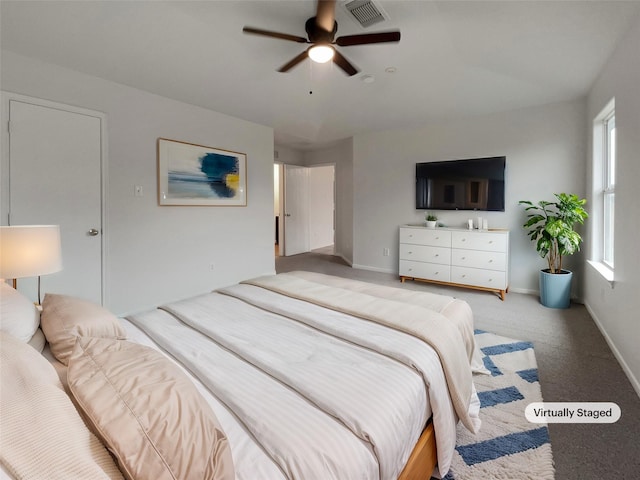 carpeted bedroom with ceiling fan