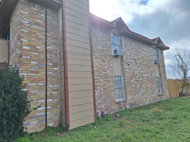 view of home's exterior featuring a yard