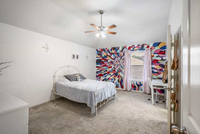 bedroom with lofted ceiling, carpet flooring, and ceiling fan