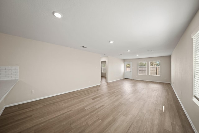 empty room featuring hardwood / wood-style floors