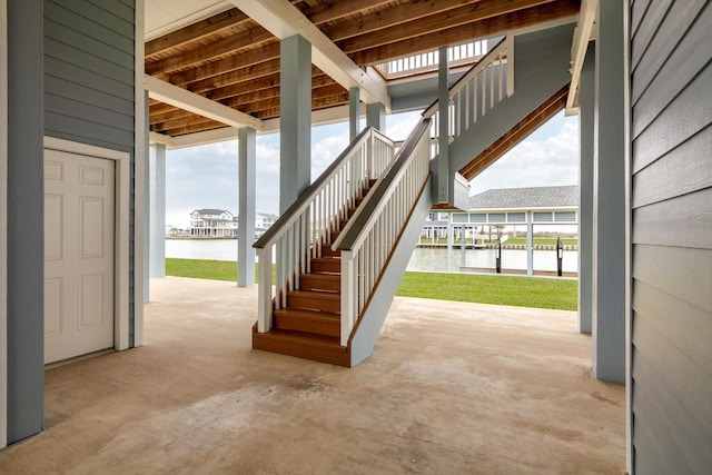 stairs featuring a water view