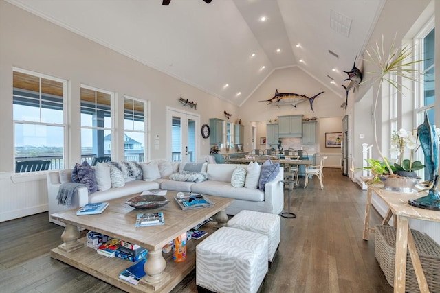 living room with french doors, ceiling fan, dark hardwood / wood-style floors, and high vaulted ceiling