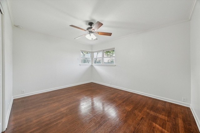 unfurnished room featuring crown molding, dark wood-type flooring, and ceiling fan