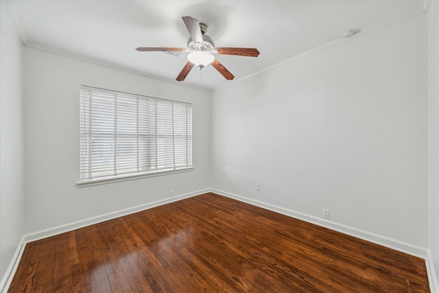 spare room with crown molding, ceiling fan, and wood-type flooring