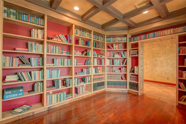 sitting room featuring coffered ceiling, hardwood / wood-style floors, and beam ceiling