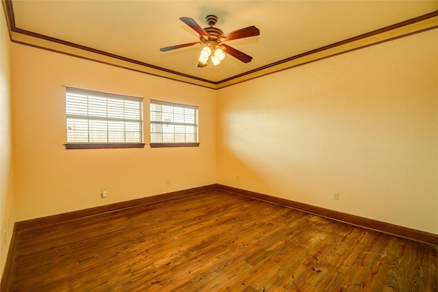 unfurnished room with hardwood / wood-style floors, ornamental molding, and ceiling fan