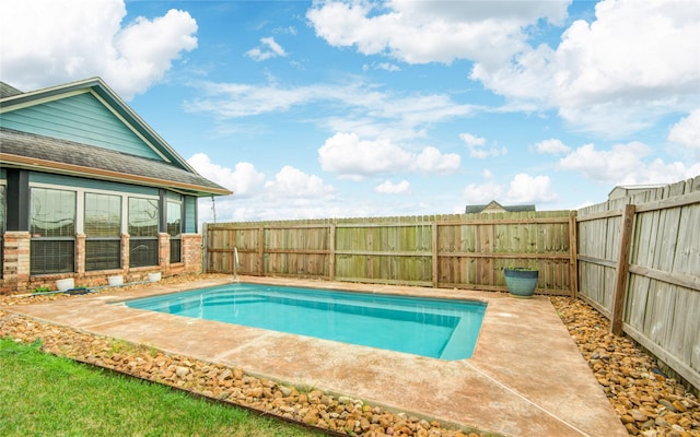 view of swimming pool featuring a patio