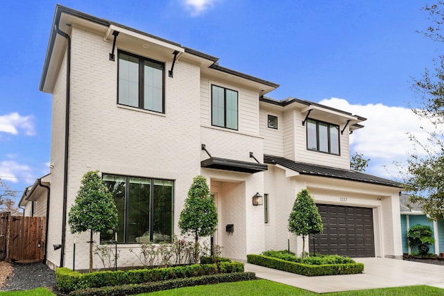 view of front of property featuring a garage