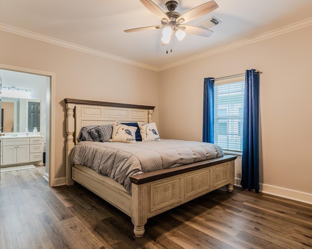 bedroom featuring connected bathroom, ornamental molding, and dark hardwood / wood-style floors