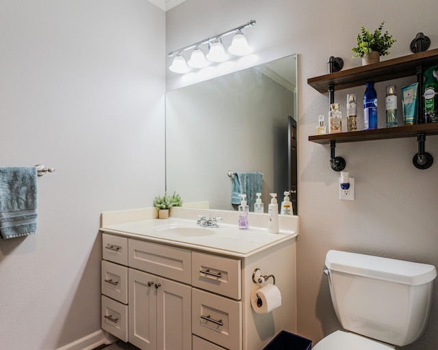 bathroom with vanity and toilet